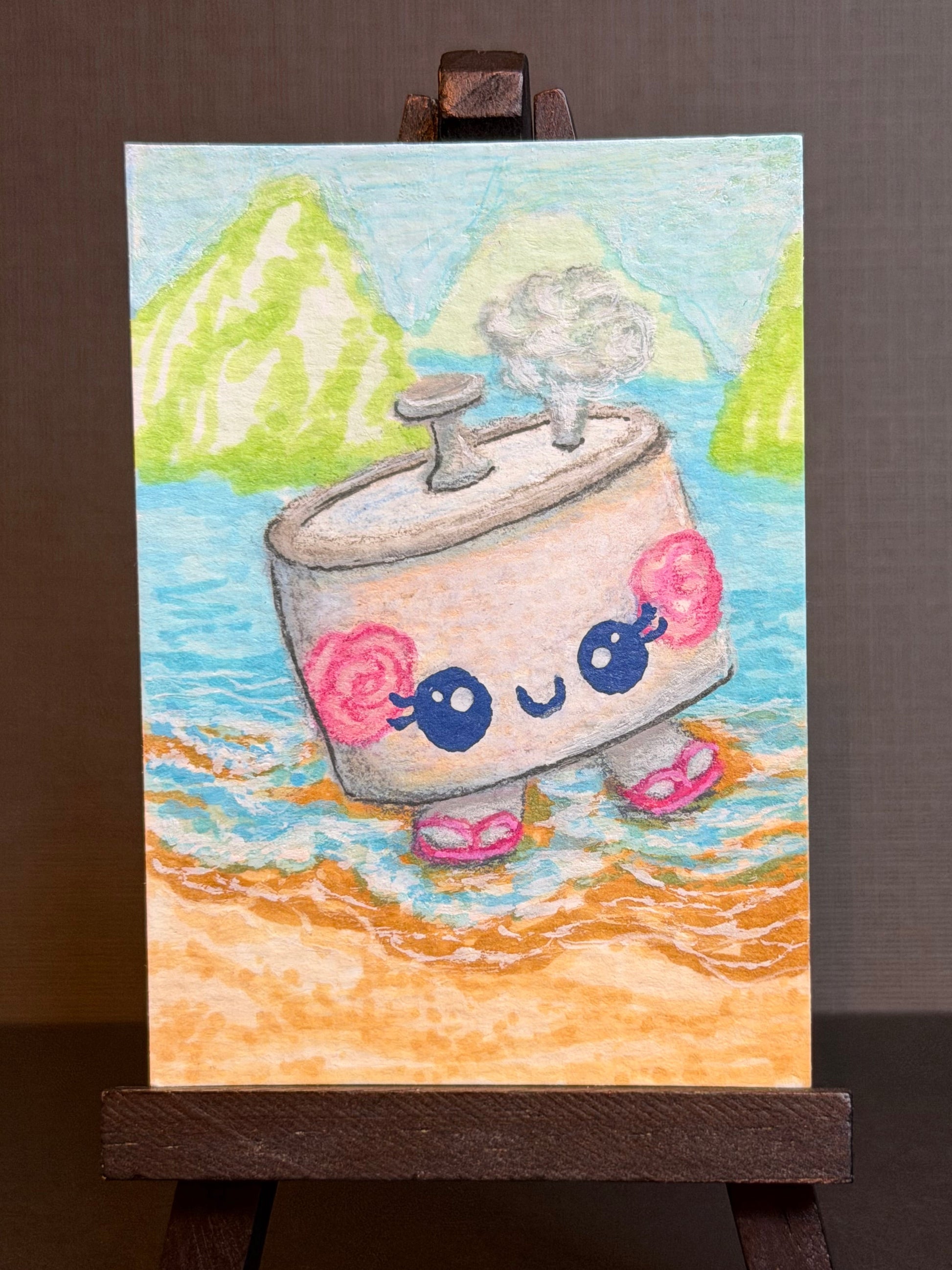 Cartoon illustration of a rice pot wearing flip-flops on the beach on an easel. ACEO by Suzanne Burbank | SuziBu.Sketches